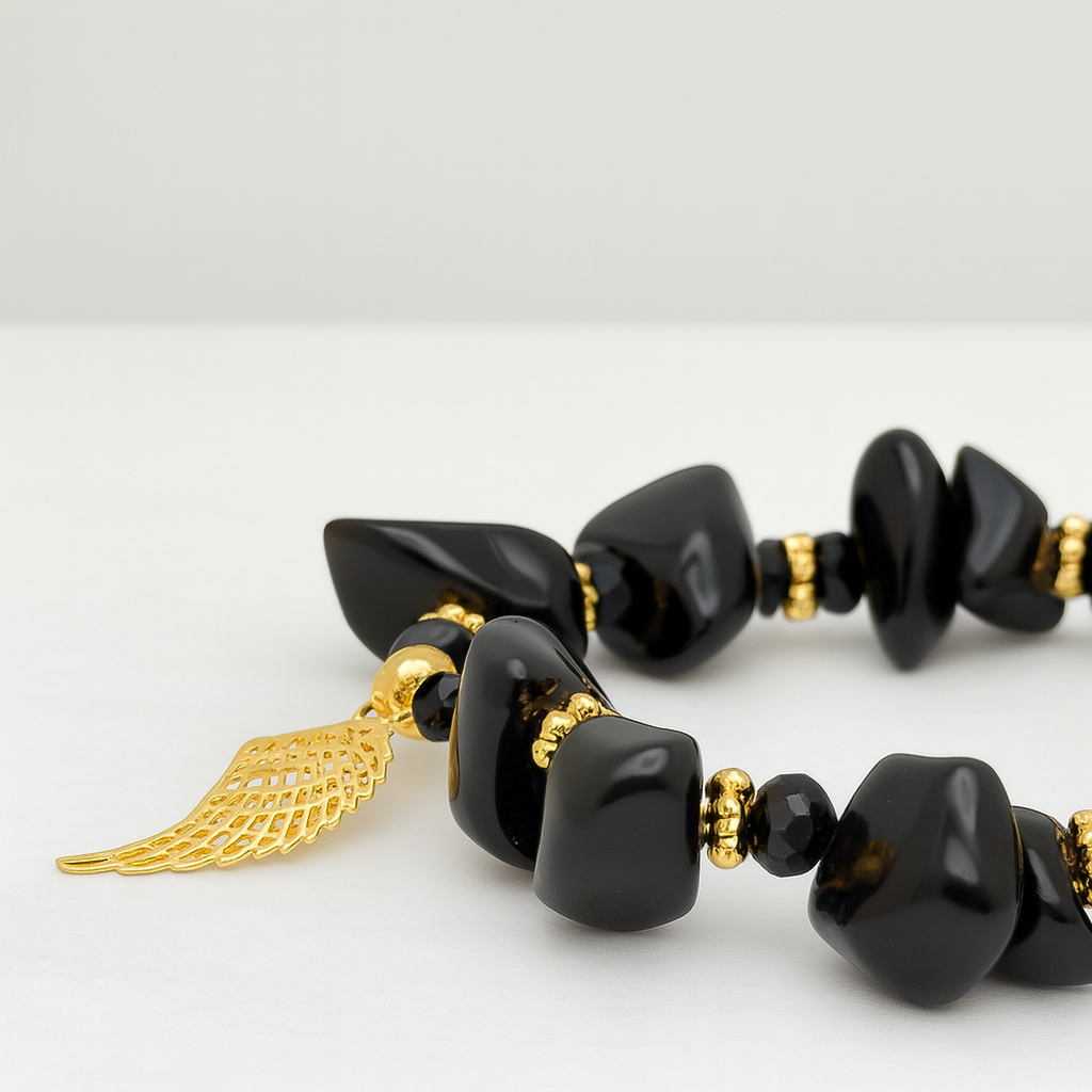 Black Onyx Shield – Gold Wing Charm Bracelet