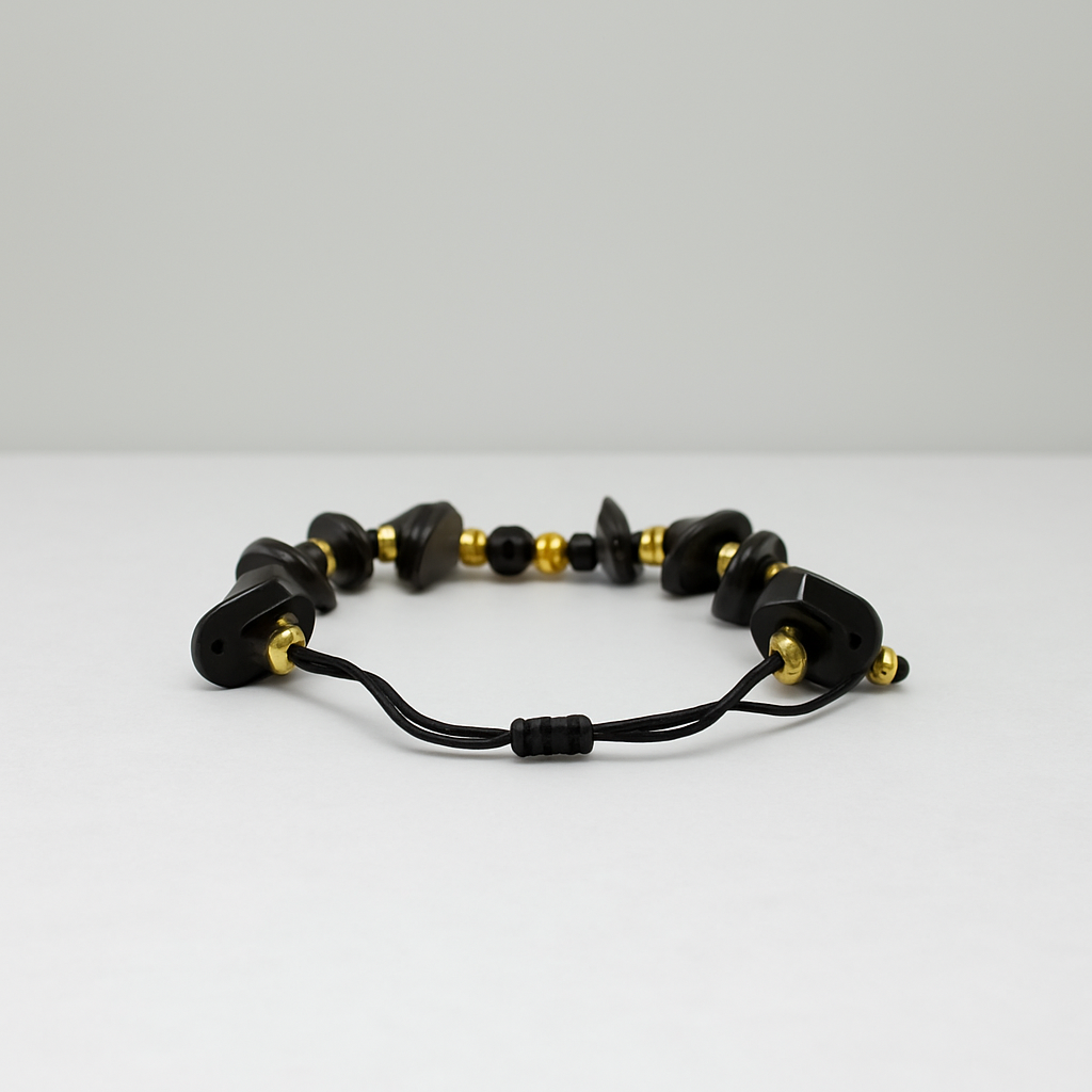 Black Onyx Shield – Gold Wing Charm Bracelet